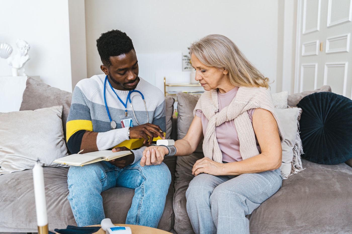 A care professional supporting a client at home